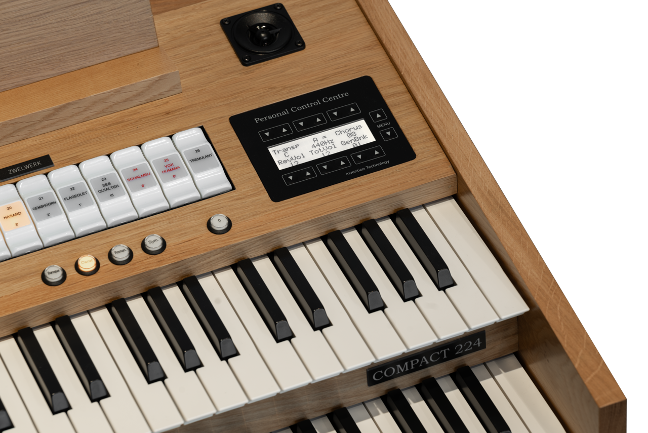 Compact 224 — detalle lateral